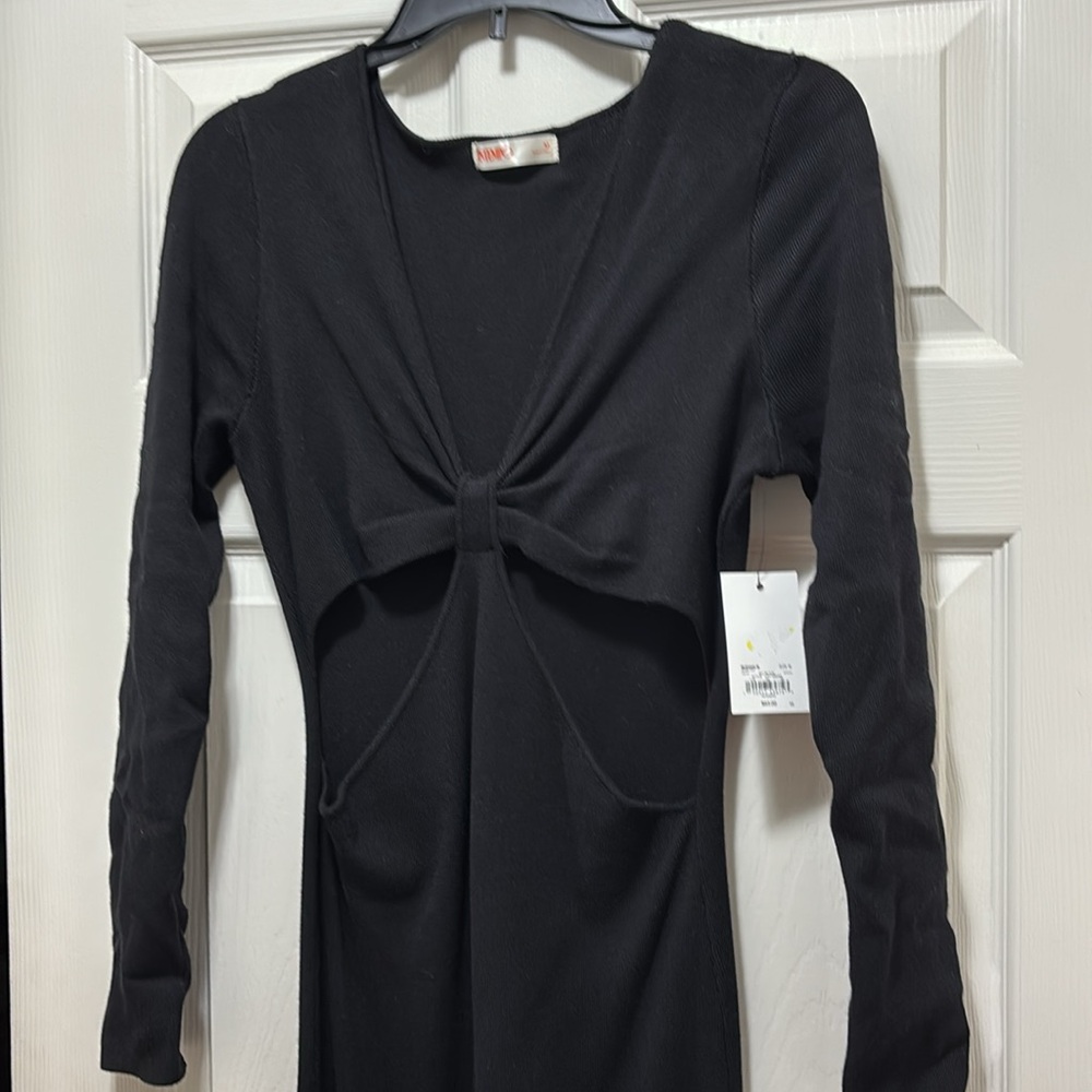 Nice fitted maxi deep plunge neckline with cutouts on the sides.